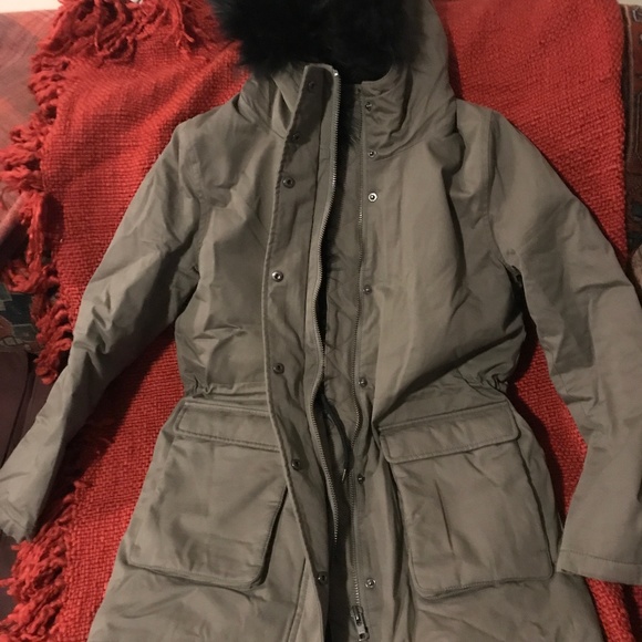 A green canvas jacket from the Kooples